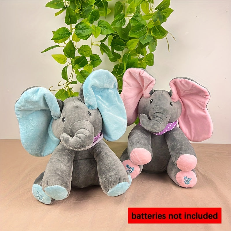 Two plush elephants with blue and pink ears on a beige surface with green leaves in the background.