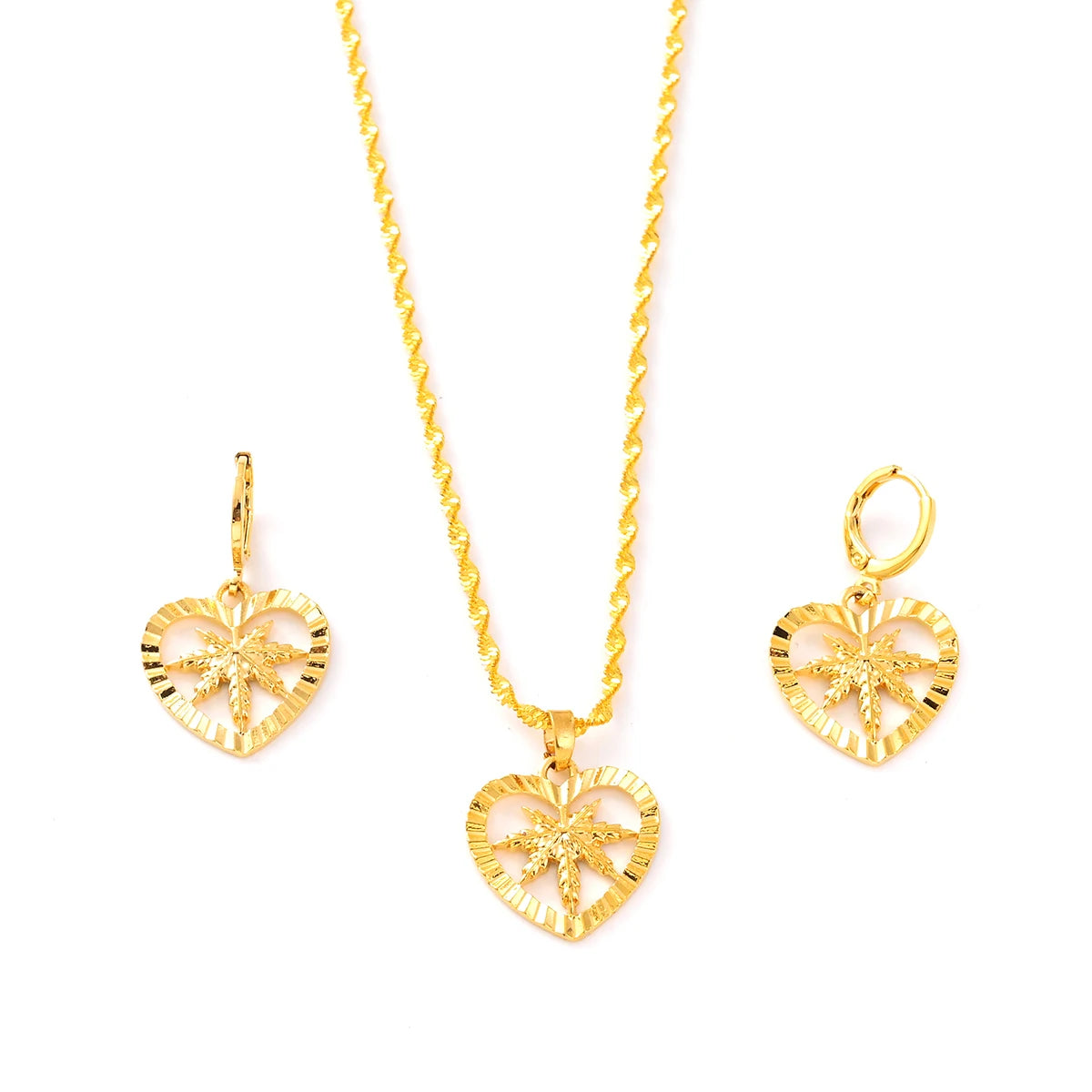 Gold heart-shaped necklace and earrings on a white background
