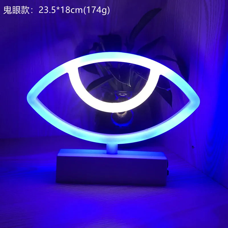 Neon eye-shaped lamp with blue and white light on a dark background