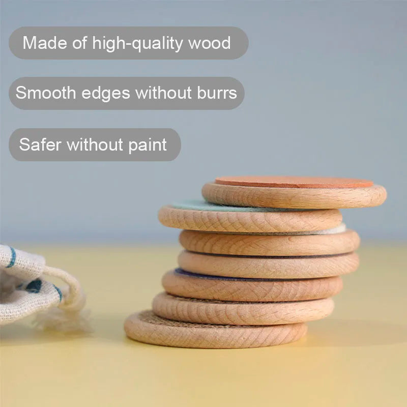 Stack of wooden rings with text highlighting safety and quality features on a light background
