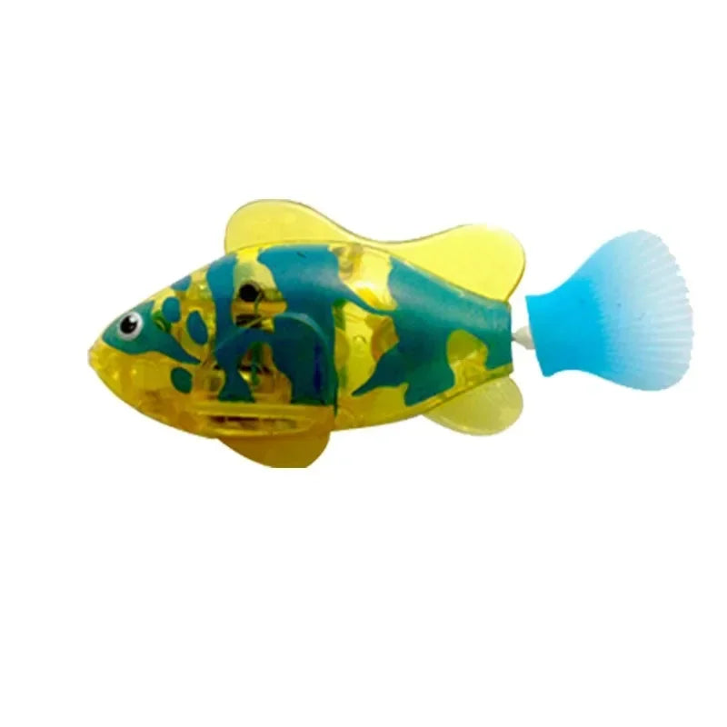 Toy fish with yellow body and blue fins on a white background