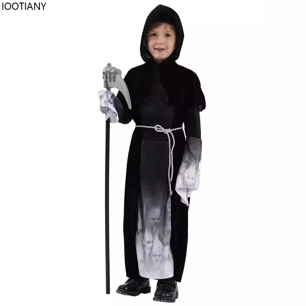 Child wearing a black hooded costume with a long robe, holding a staff, on a white background.
