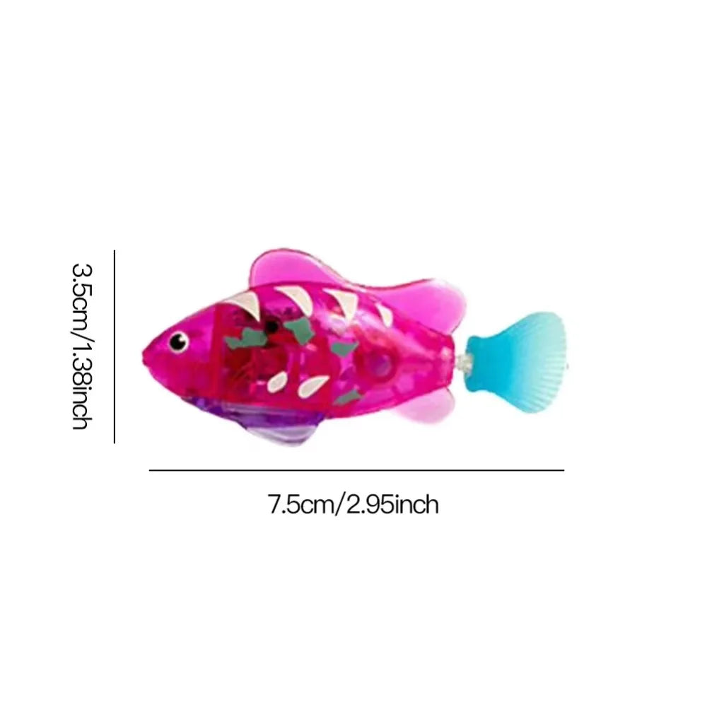 Pink toy fish with measurements on a white background