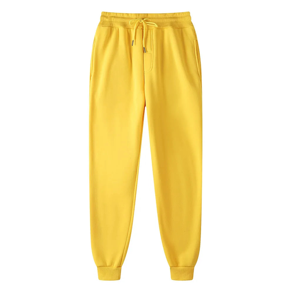 Yellow sweatpants on a white background