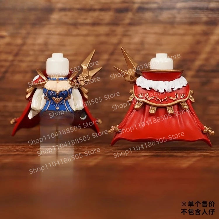 Two figurines on a wooden surface with blurred background