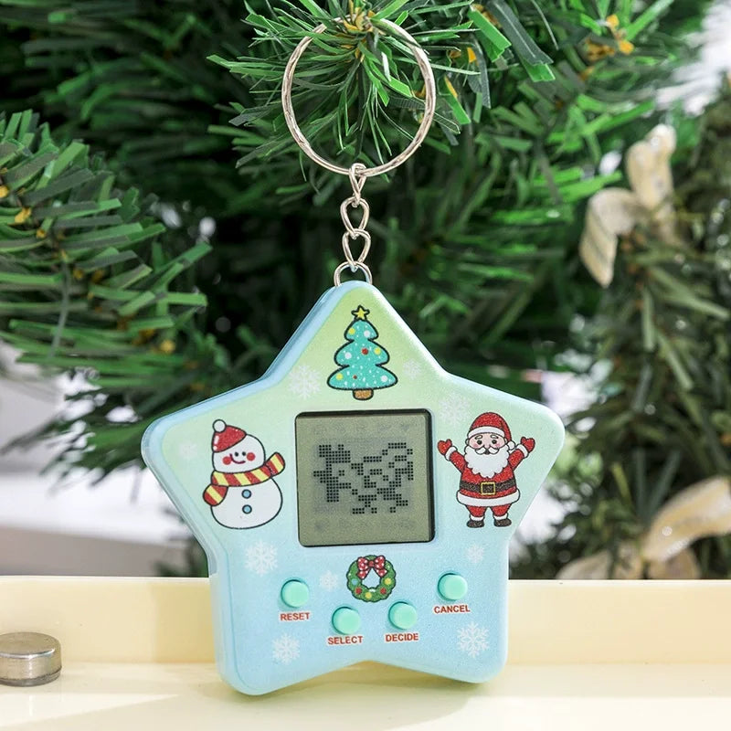 Star-shaped digital toy with Christmas-themed characters on a surface with a blurred green tree background