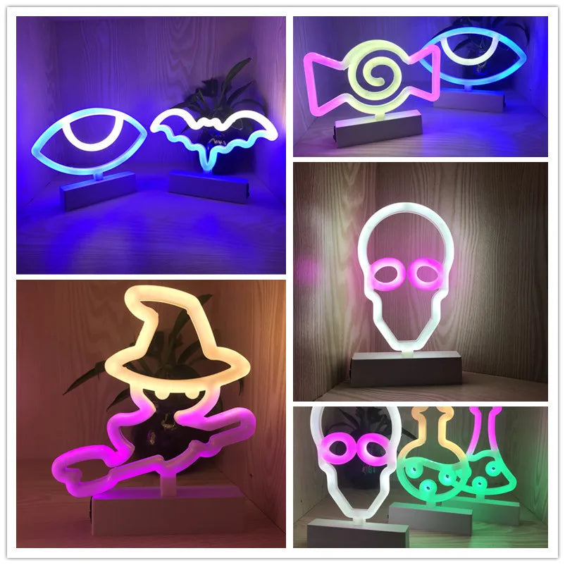 Collage of various neon light shapes including eye, bat, witch hat, and infinity symbol on a wooden surface.