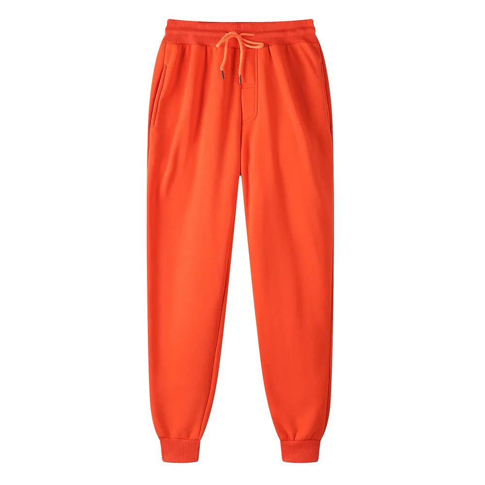 Orange sweatpants on a white background