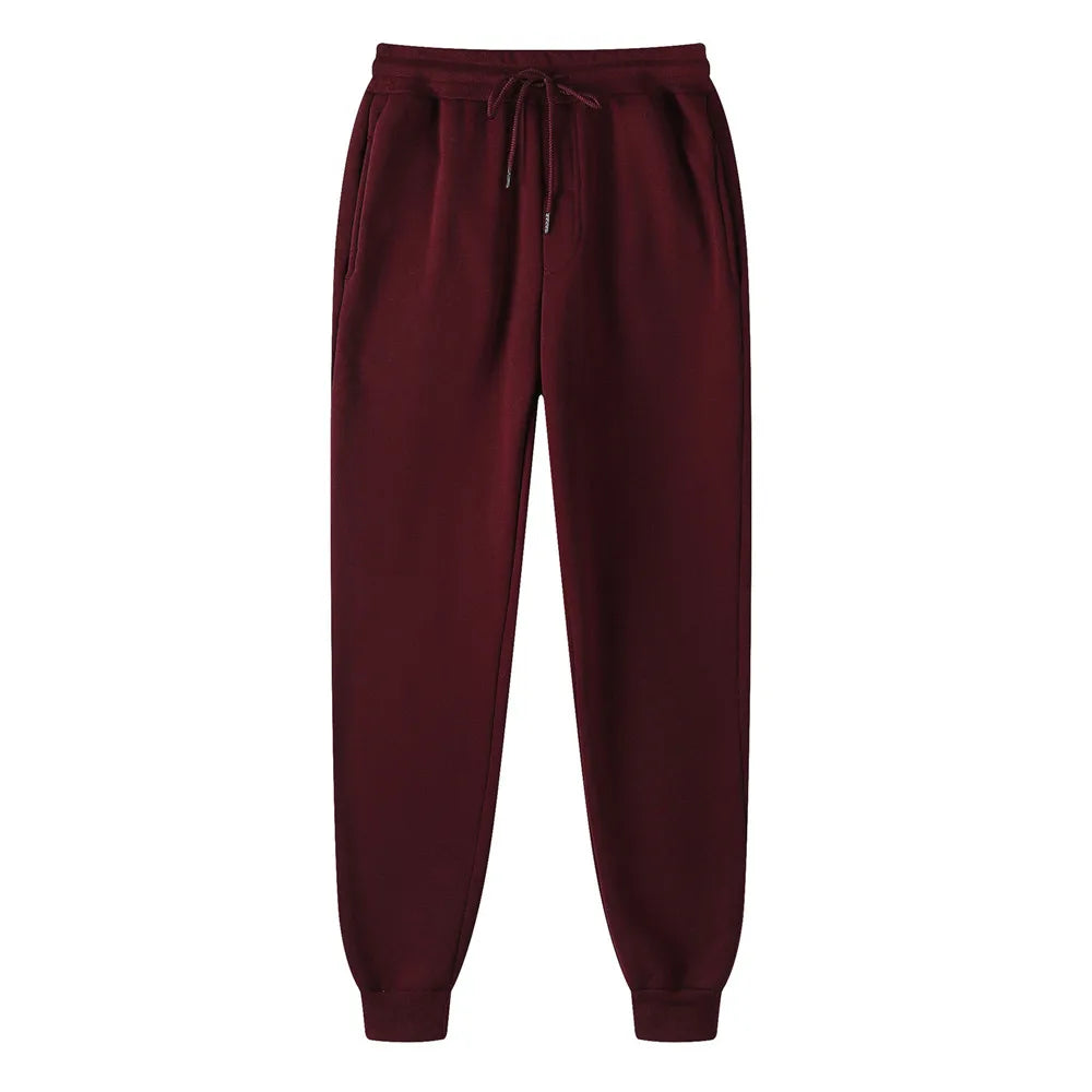 Maroon sweatpants on a white background