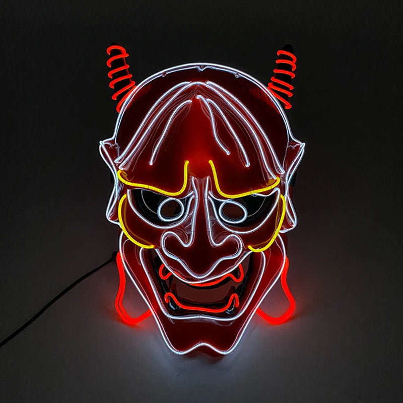 Neon mask with red, yellow, and white lights on a black background