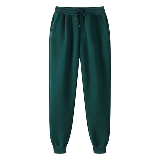 Green sweatpants on a white background